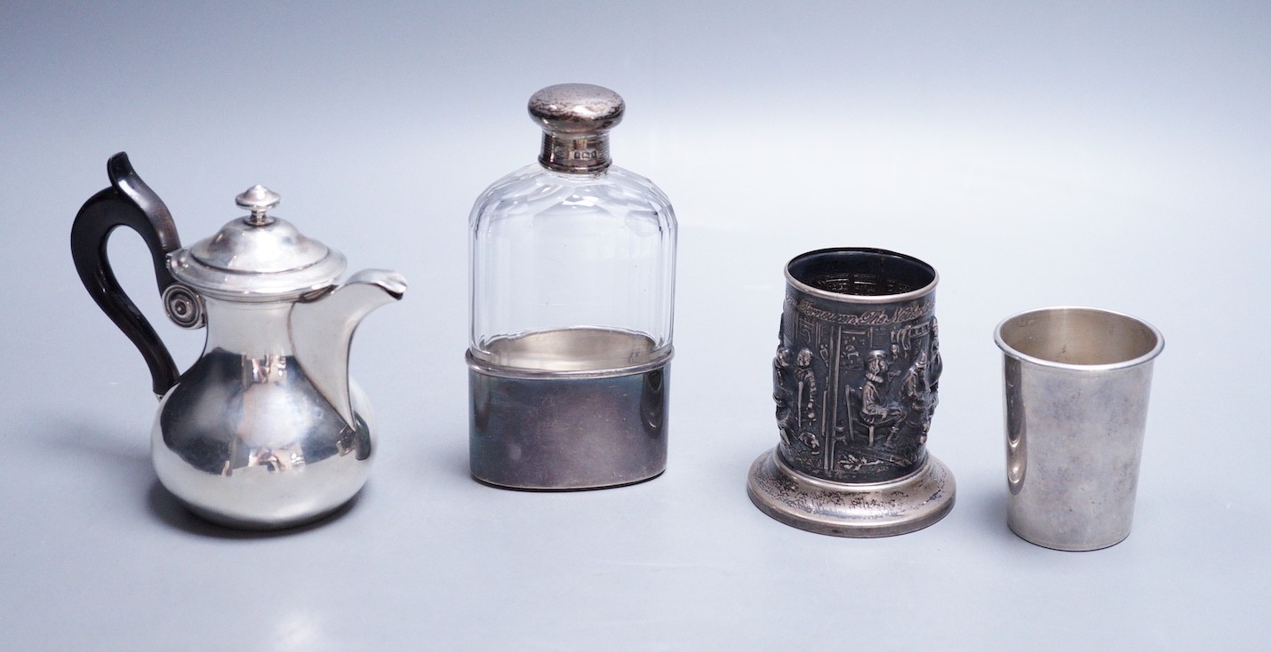 A Dutch embossed white metal cylindrical vase, 75mm, a French white metal small bachelor's hot water pot, an Italian 925 small beaker and a silver capped hip flask with plated cup.